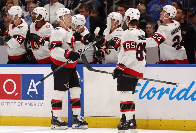 Apr 11, 2024; Tampa, Florida, USA; Ottawa Senators left wing Brady Tkachuk (7) is congratulated after he scored  goal against the Tampa Bay Lightning during the first period at Amalie Arena. Mandatory Credit: Kim Klement Neitzel-USA TODAY Sports