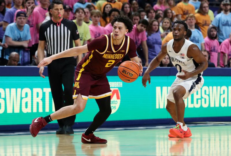 Jan 27, 2024; University Park, Pennsylvania, USA; Minnesota Golden Gophers guard Mike Mitchell Jr (2) dribbles the ball passed Penn State Nittany Lions guard Kanye Clary (0) during the second half at Bryce Jordan Center. Minnesota defeated Penn State 83-74. Mandatory Credit: Matthew O'Haren-USA TODAY Sports