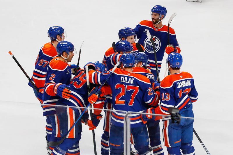 Oct 15, 2024; Edmonton, Alberta, CAN; The Edmonton Oilers celebrate a goal scored by forward Leon Draisaitl (29) during overtime against the Philadelphia Flyers  at Rogers Place. Mandatory Credit: Perry Nelson-Imagn Images