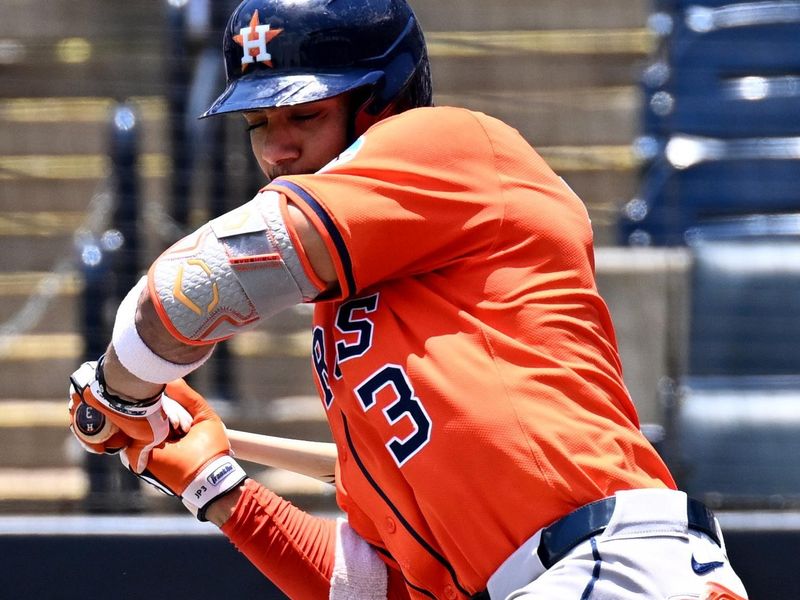 May 21, 2025; St. Petersburg, Florida, USA; Houston Astros shortstop Jeremy Pena (3) gets hit by a pitch in the first inning against the Tampa Bay Rays  at George M. Steinbrenner Field. Mandatory Credit: Jonathan Dyer-Imagn Images