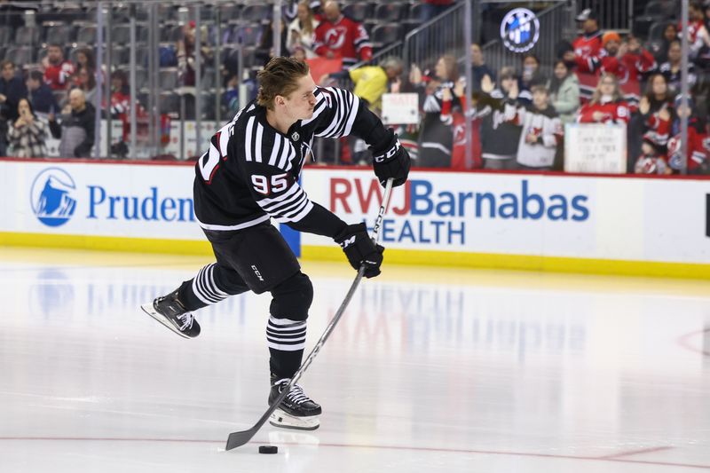 Jan 6, 2024; Newark, New Jersey, USA; New Jersey Devils right wing Graeme Clarke (95) takes his rookie lap before the start of warmups for their game against the Vancouver Canucks at Prudential Center. Mandatory Credit: Ed Mulholland-USA TODAY Sports