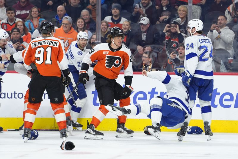 Jan 12, 2026; Philadelphia, Pennsylvania, USA; Philadelphia Flyers right wing Nikita Grebenkin (29) fights Tampa Bay Lightning center Dominic James (17) in the third period at Xfinity Mobile Arena. Mandatory Credit: Kyle Ross-Imagn Images