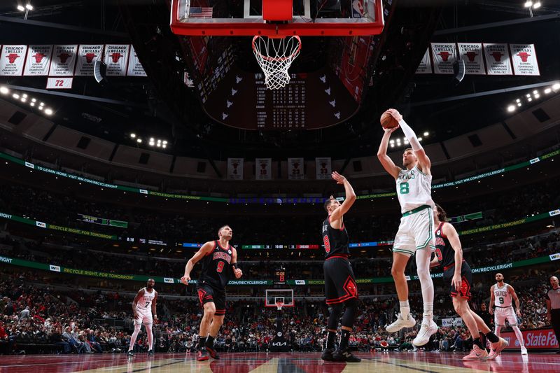 CHICAGO, IL - NOVEMBER 29: Kristaps Porzingis #8 of the Boston Celtics shoots the ball during the game against the Chicago Bulls during the Emirates NBA Cup game on November 29, 2024 at United Center in Chicago, Illinois. NOTE TO USER: User expressly acknowledges and agrees that, by downloading and or using this photograph, User is consenting to the terms and conditions of the Getty Images License Agreement. Mandatory Copyright Notice: Copyright 2024 NBAE (Photo by Jeff Haynes/NBAE via Getty Images)