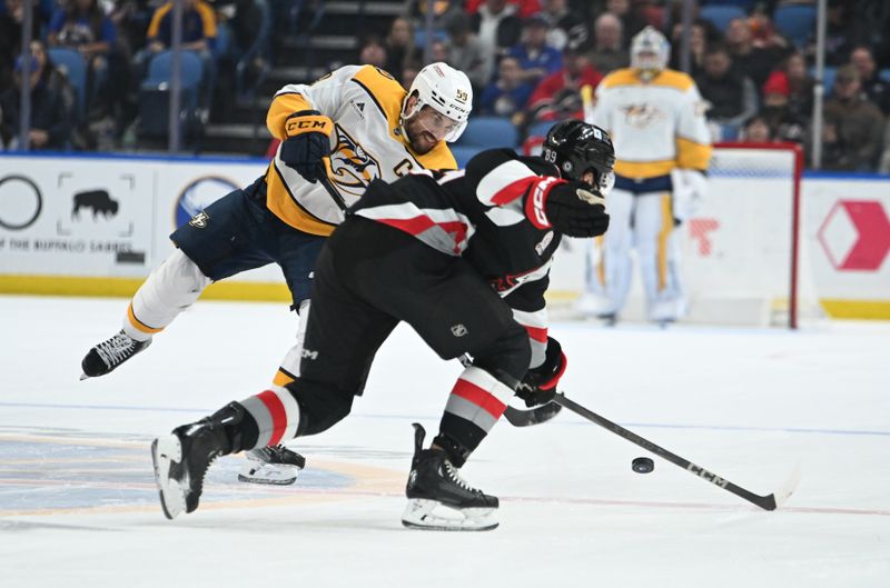 Jan 31, 2025; Buffalo, New York, USA; Nashville Predators defenseman Roman Josi (59) shoots the puck past Buffalo Sabres right wing Alex Tuch (89) in the first period at the KeyBank Center. Mandatory Credit: Mark Konezny-Imagn Images
