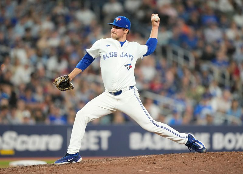 Jun 18, 2024; Toronto, Ontario, CAN; Toronto Blue Jays pitcher Brendon Little (54) pitches to the Boston Red Sox during the eighth inning at Rogers Centre. Mandatory Credit: John E. Sokolowski-USA TODAY Sports