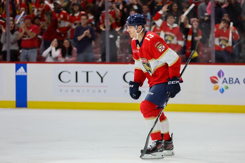 Apr 21, 2024; Sunrise, Florida, USA; Florida Panthers center Sam Reinhart (13) looks on after scoring against the Tampa Bay Lightning during the first period in game one of the first round of the 2024 Stanley Cup Playoffs at Amerant Bank Arena. Mandatory Credit: Sam Navarro-USA TODAY Sports