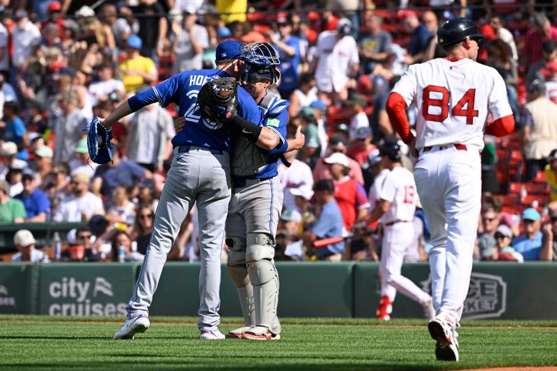 Jun 29, 2025; Boston, Massachusetts, USA; Toronto Blue Jays catcher Tyler Heineman (55)  and relief pitcher Jeff Hoffman (23) celebrate beating the Boston Red Sox at Fenway Park. Mandatory Credit: Eric Canha-Imagn Images