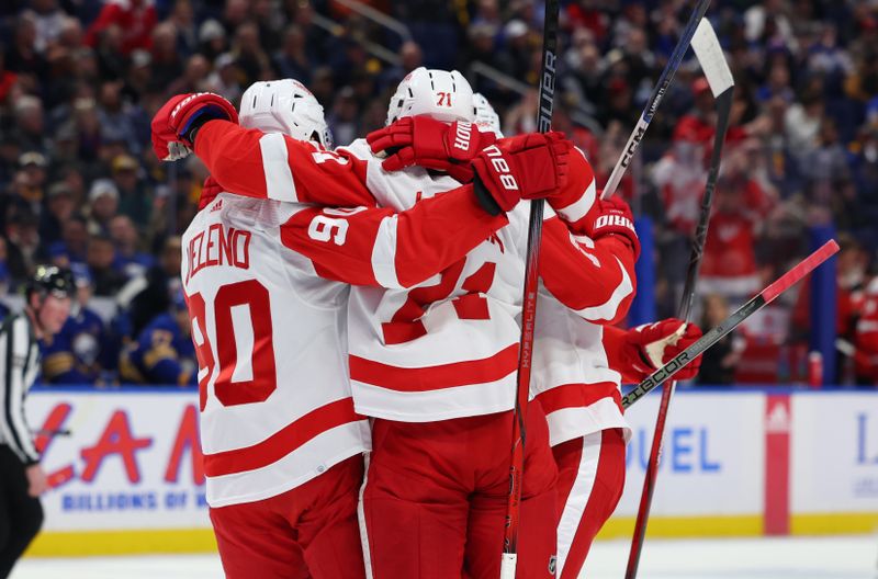 Dec 5, 2023; Buffalo, New York, USA;  Detroit Red Wings center Dylan Larkin (71) celebrates his goal with teammates during the first period against the Buffalo Sabres at KeyBank Center. Mandatory Credit: Timothy T. Ludwig-USA TODAY Sports