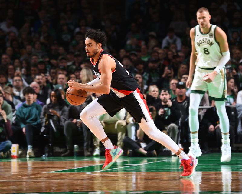 BOSTON, MA - APRIL 7: Justin Minaya #24 of the Portland Trail Blazers handles the ball during the game  on April 7, 2024 at the TD Garden in Boston, Massachusetts. NOTE TO USER: User expressly acknowledges and agrees that, by downloading and or using this photograph, User is consenting to the terms and conditions of the Getty Images License Agreement. Mandatory Copyright Notice: Copyright 2024 NBAE  (Photo by Brian Babineau/NBAE via Getty Images)