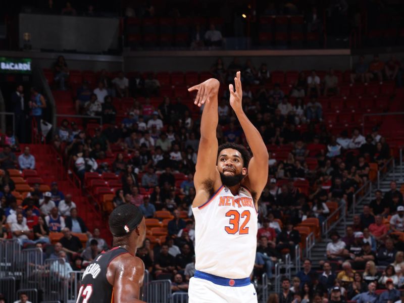 MIAMI, FL - OCTOBER 30: Karl-Anthony Towns #32 of the New York Knicks shoots a three point basket during the game against the Miami Heat on October 30, 2024 at Kaseya Center in Miami, Florida. NOTE TO USER: User expressly acknowledges and agrees that, by downloading and or using this Photograph, user is consenting to the terms and conditions of the Getty Images License Agreement. Mandatory Copyright Notice: Copyright 2024 NBAE (Photo by Jeff Haynes/NBAE via Getty Images)