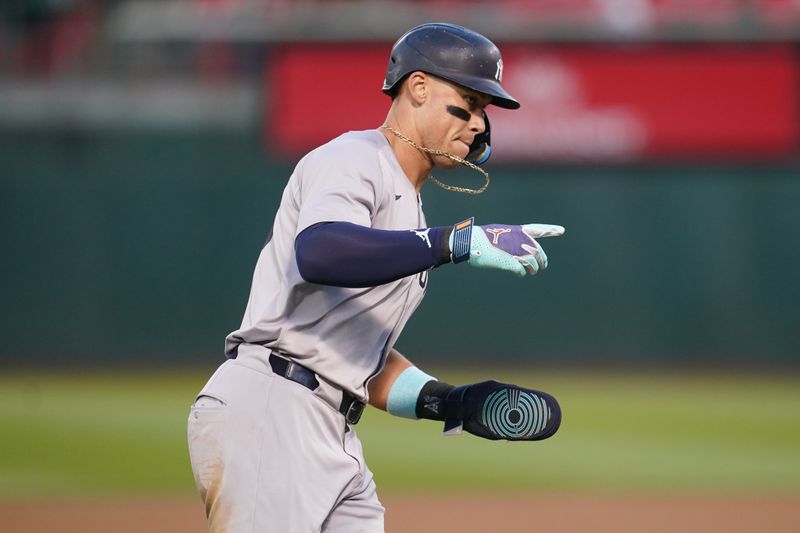 Sep 21, 2024; Oakland, California, USA; New York Yankees outfielder Aaron Judge (99) rounds third base before scoring a run against the Oakland Athletics in the third inning at the Oakland-Alameda County Coliseum. Mandatory Credit: Cary Edmondson-Imagn Images