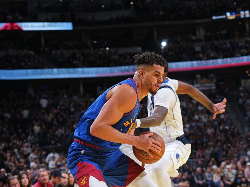 DENVER, CO - NOVEMBER 22:  Michael Porter Jr. #1 of the Denver Nuggets dribbles the ball during the game against the Dallas Mavericks during the Emirates NBA Cup game on November 22, 2024 at Ball Arena in Denver, Colorado. NOTE TO USER: User expressly acknowledges and agrees that, by downloading and/or using this Photograph, user is consenting to the terms and conditions of the Getty Images License Agreement. Mandatory Copyright Notice: Copyright 2024 NBAE (Photo by Bart Young/NBAE via Getty Images)