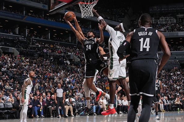 BROOKLYN, NY - DECEMBER 27: Cam Thomas #24 of the Brooklyn Nets drives to the basket during the game against the Milwaukee Bucks on December 27, 2023 at Barclays Center in Brooklyn, New York. NOTE TO USER: User expressly acknowledges and agrees that, by downloading and or using this Photograph, user is consenting to the terms and conditions of the Getty Images License Agreement. Mandatory Copyright Notice: Copyright 2023 NBAE (Photo by Jesse D. Garrabrant/NBAE via Getty Images)