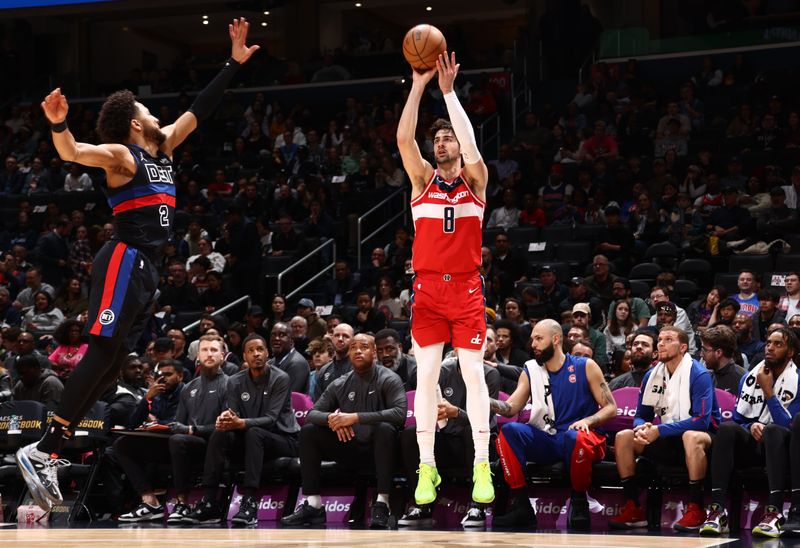 WASHINGTON, DC -? MARCH 29: Deni Avdija #8 of the Washington Wizards shoots a three point basket during the game against the Detroit Pistons on March 29, 2024 at Capital One Arena in Washington, DC. NOTE TO USER: User expressly acknowledges and agrees that, by downloading and or using this Photograph, user is consenting to the terms and conditions of the Getty Images License Agreement. Mandatory Copyright Notice: Copyright 2024 NBAE (Photo by Kenny Giarla/NBAE via Getty Images)