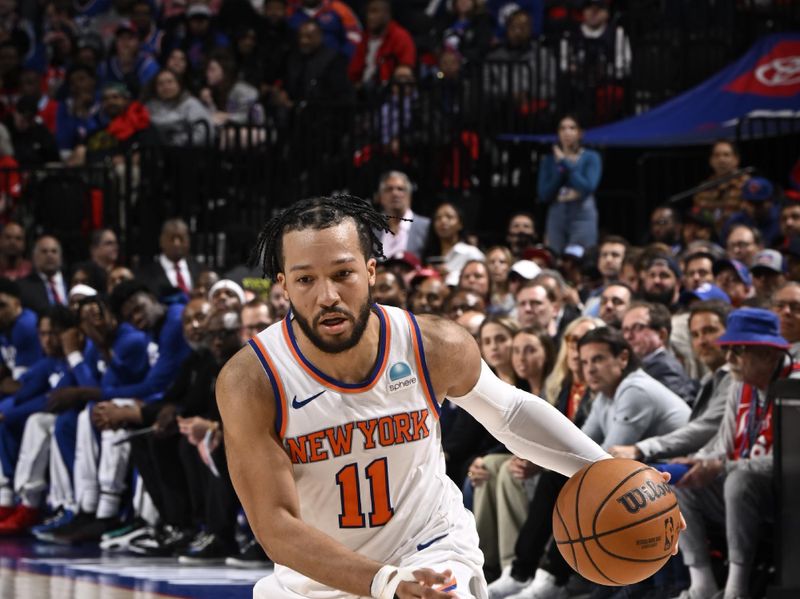 PHILADELPHIA, PA - APRIL 25: Jalen Brunson #11 of the New York Knicks handles the ball during the game against the Philadelphia 76ers during Round 1 Game 3 of the 2024 NBA Playoffs on April 25, 2024 at the Wells Fargo Center in Philadelphia, Pennsylvania NOTE TO USER: User expressly acknowledges and agrees that, by downloading and/or using this Photograph, user is consenting to the terms and conditions of the Getty Images License Agreement. Mandatory Copyright Notice: Copyright 2024 NBAE (Photo by David Dow/NBAE via Getty Images)