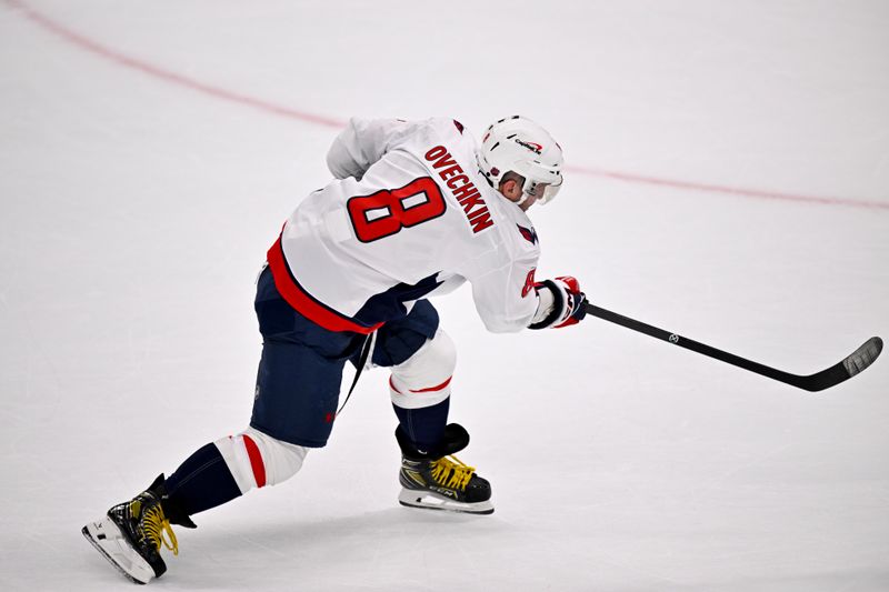 Oct 28, 2025; Dallas, Texas, USA; Washington Capitals left wing Alex Ovechkin (8) takes a shot in the Dallas Stars zone during the third period at the American Airlines Center. Mandatory Credit: Jerome Miron-Imagn Images