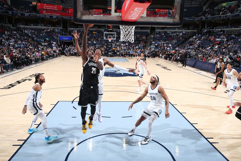 MEMPHIS, TN - February 26:  Dorian Finney-Smith #28 of the Brooklyn Nets drives to the basket during the game against the Memphis Grizzlies on February 26, 2024 at FedExForum in Memphis, Tennessee. NOTE TO USER: User expressly acknowledges and agrees that, by downloading and or using this photograph, User is consenting to the terms and conditions of the Getty Images License Agreement. Mandatory Copyright Notice: Copyright 2024 NBAE (Photo by Joe Murphy/NBAE via Getty Images)