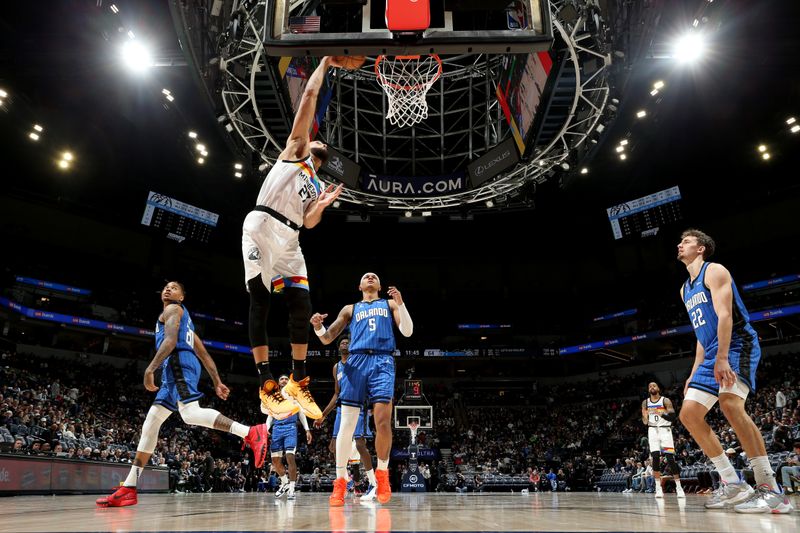 MINNEAPOLIS, MN -  FEBRUARY 3: Rudy Gobert #27 of the Minnesota Timberwolves drives to the basket against the Orlando Magic on February 3, 2023 at Target Center in Minneapolis, Minnesota. NOTE TO USER: User expressly acknowledges and agrees that, by downloading and or using this Photograph, user is consenting to the terms and conditions of the Getty Images License Agreement. Mandatory Copyright Notice: Copyright 2023 NBAE (Photo by David Sherman/NBAE via Getty Images)