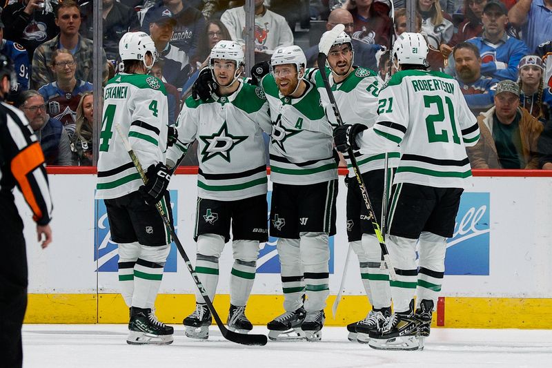 May 13, 2024; Denver, Colorado, USA; Dallas Stars center Wyatt Johnston (53) celebrates his goal with defenseman Miro Heiskanen (4) and center Joe Pavelski (16) and left wing Mason Marchment (27) and left wing Jason Robertson (21) in the second period against the Colorado Avalanche in game four of the second round of the 2024 Stanley Cup Playoffs at Ball Arena. Mandatory Credit: Isaiah J. Downing-USA TODAY Sports