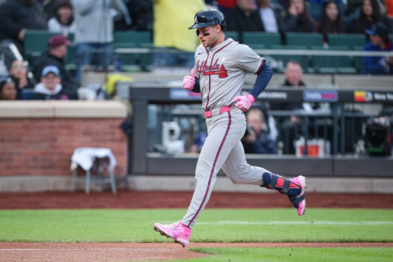 May 12, 2024; New York City, New York, USA; Atlanta Braves left fielder Jarred Kelenic (24) scores a run after his solo home run during the second inning against the New York Mets at Citi Field. Mandatory Credit: Vincent Carchietta-USA TODAY Sports