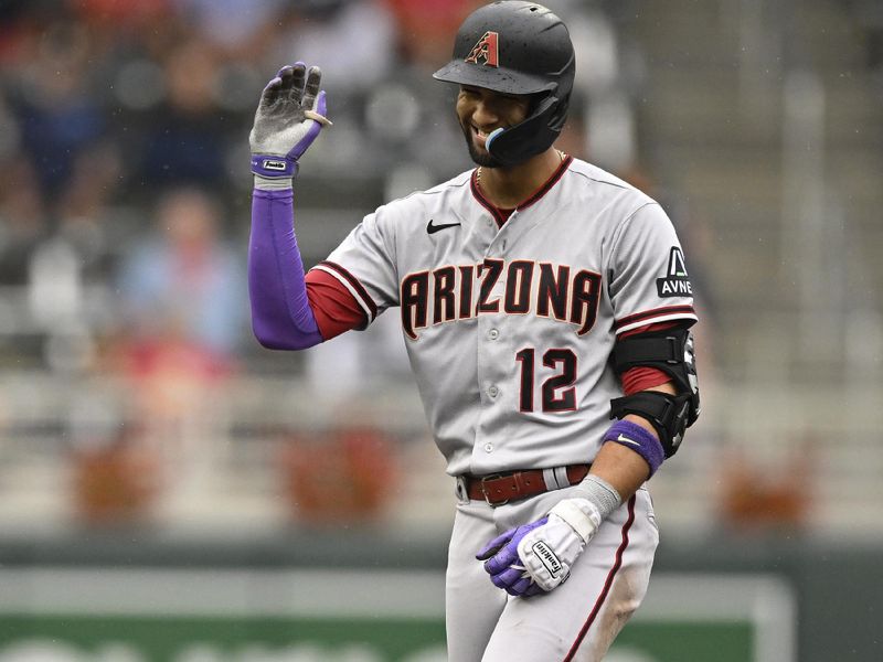 Aug 6, 2023; Minneapolis, Minnesota, USA;  Arizona Diamondbacks outfielder Lourdes Gurriel (12) celebrates his double against the Minnesota Twins during the seventh inning at Target Field. Mandatory Credit: Nick Wosika-USA TODAY Sports