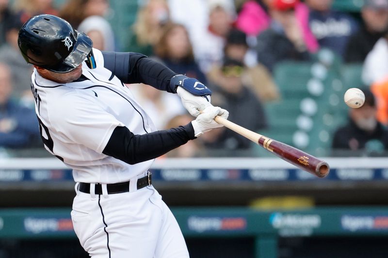 Apr 30, 2023; Detroit, Michigan, USA;  Detroit Tigers infielder Zack Short (59) hits a single in the eighth inning against the Baltimore Orioles at Comerica Park. Mandatory Credit: Rick Osentoski-USA TODAY Sports