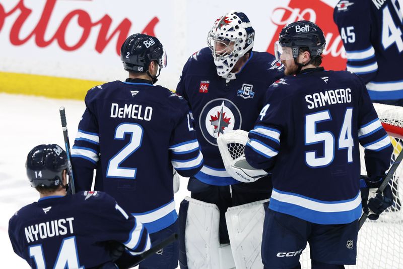 Mar 24, 2026; Winnipeg, Manitoba, CAN; Winnipeg Jets celebrate their victory against the Vegas Golden Knights at Canada Life Centre. Mandatory Credit: James Carey Lauder-Imagn Images