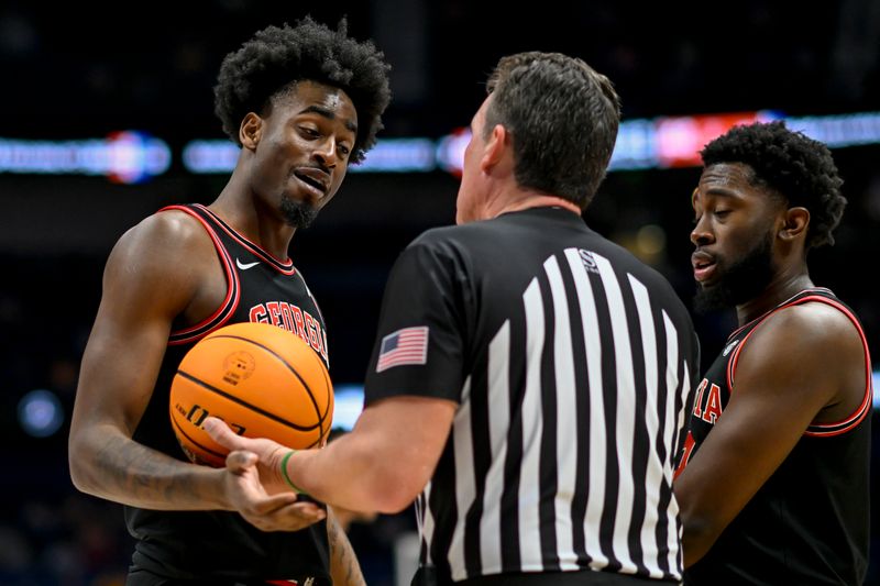 Mar 14, 2024; Nashville, TN, USA;  Georgia Bulldogs forward Jalen DeLoach (23) talks with the referee against the Florida Gators during the second half at Bridgestone Arena. Mandatory Credit: Steve Roberts-USA TODAY Sports