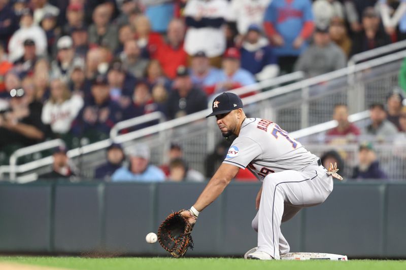 Oct 11, 2023; Minneapolis, Minnesota, USA; Houston Astros first baseman Jose Abreu (79) fields the ball fro an out in the fourth inning against the Minnesota Twins during game four of the ALDS for the 2023 MLB playoffs at Target Field. Mandatory Credit: Jesse Johnson-USA TODAY Sports