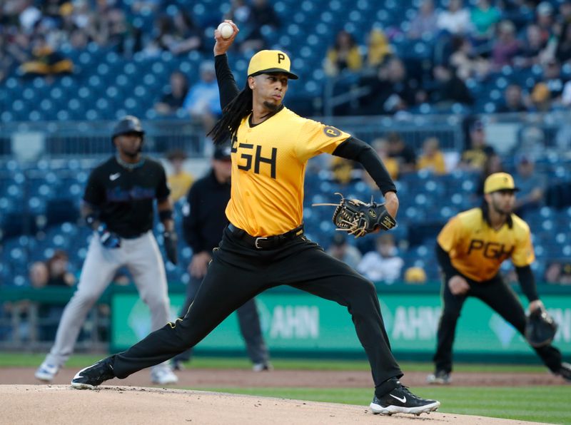 Sep 29, 2023; Pittsburgh, Pennsylvania, USA;  Pittsburgh Pirates starting pitcher Osvaldo Bido (70) delivers a pitch against the Miami Marlins during the first inning at PNC Park. Mandatory Credit: Charles LeClaire-USA TODAY Sports