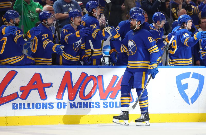 Feb 25, 2025; Buffalo, New York, USA;  Buffalo Sabres right wing Alex Tuch (89) celebrates his goal with teammates during the third period against the Anaheim Ducks at KeyBank Center. Mandatory Credit: Timothy T. Ludwig-Imagn Images