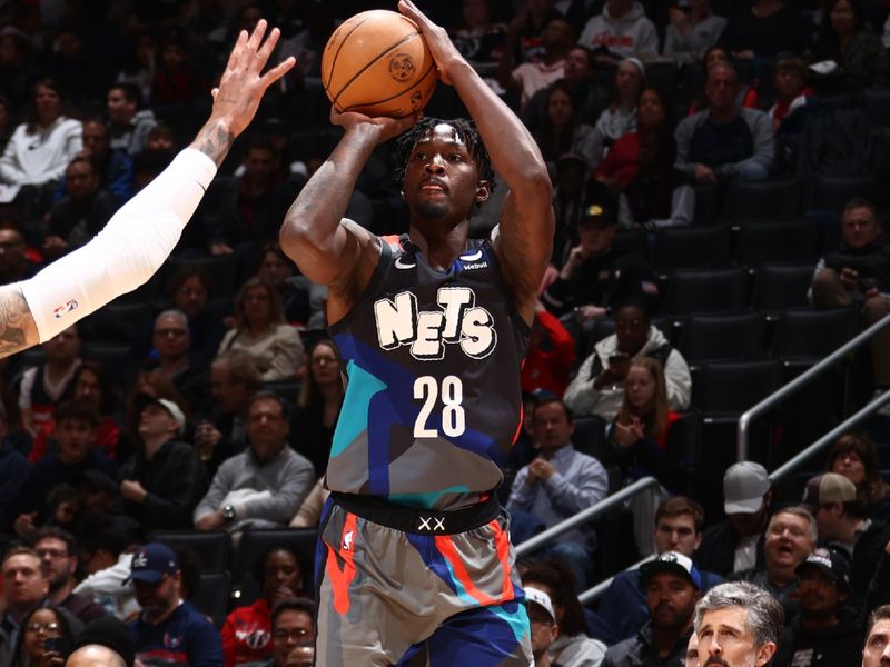 WASHINGTON, DC -? MARCH 27: Dorian Finney-Smith #28 of the Brooklyn Nets shoots a three point basket against the Washington Wizards on March 27, 2024 NBAE at Capital One Arena in Washington, DC. NOTE TO USER: User expressly acknowledges and agrees that, by downloading and or using this Photograph, user is consenting to the terms and conditions of the Getty Images License Agreement. Mandatory Copyright Notice: Copyright 2024 NBAE (Photo by Kenny Giarla/NBAE via Getty Images)