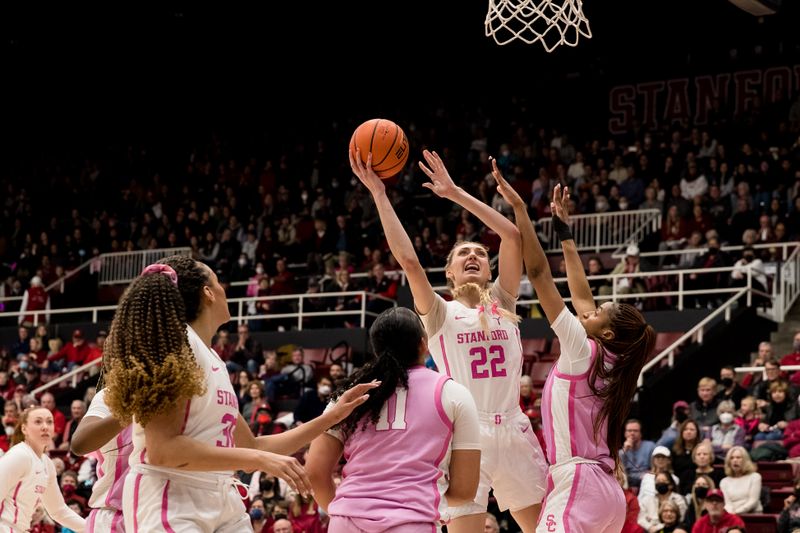 Feb 17, 2023; Stanford, California, USA;  Stanford Cardinal forward Cameron Brink (22) shoots as USC Trojans forward Kadi Sissoko (30) defends during the first half at Maples Pavilion. Mandatory Credit: John Hefti-USA TODAY Sports