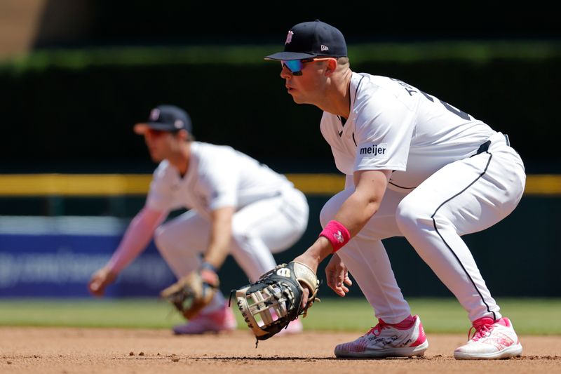 May 12, 2024; Detroit, Michigan, USA;  Detroit Tigers first baseman Spencer Torkelson (20) and second baseman Colt Keith (33) in the field in the fifth inning against the Houston Astros at Comerica Park. Mandatory Credit: Rick Osentoski-USA TODAY Sports