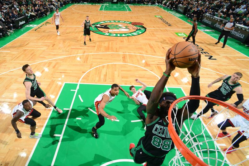 BOSTON, MA - DECEMBER 2: Neemias Queta #88 of the Boston Celtics dunks the ball during the game against the Miami Heat on December 2, 2024 at TD Garden in Boston, Massachusetts. NOTE TO USER: User expressly acknowledges and agrees that, by downloading and/or using this Photograph, user is consenting to the terms and conditions of the Getty Images License Agreement. Mandatory Copyright Notice: Copyright 2024 NBAE (Photo by Brian Babineau/NBAE via Getty Images)