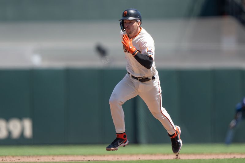 Aug 13, 2023; San Francisco, California, USA; San Francisco Giants catcher Patrick Bailey (14) runs during the fourth inning against the Texas Rangers at Oracle Park. Mandatory Credit: Stan Szeto-USA TODAY Sports