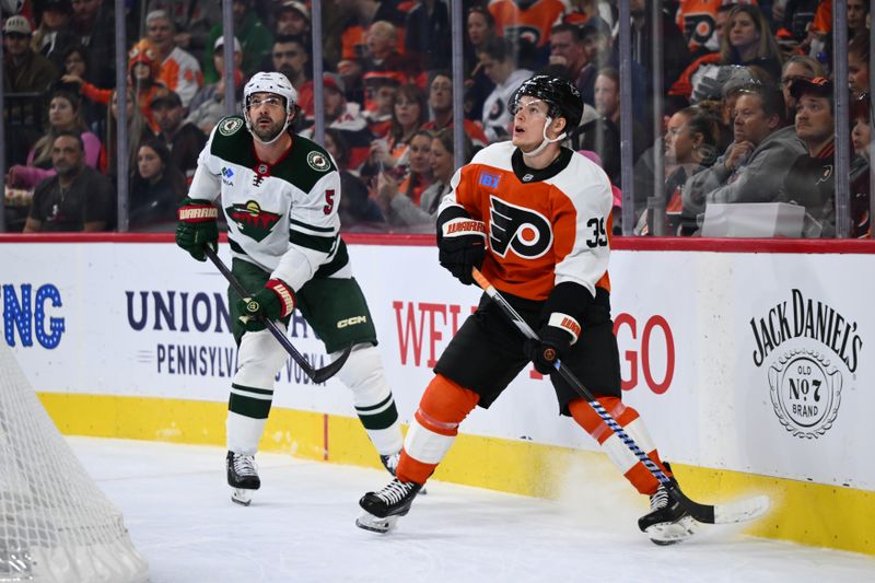 Oct 26, 2024; Philadelphia, Pennsylvania, USA; Philadelphia Flyers right wing Matvei Michkov (39) looks on against Minnesota Wild defenseman Jake Middleton (5) in the first period at Wells Fargo Center. Mandatory Credit: Kyle Ross-Imagn Images