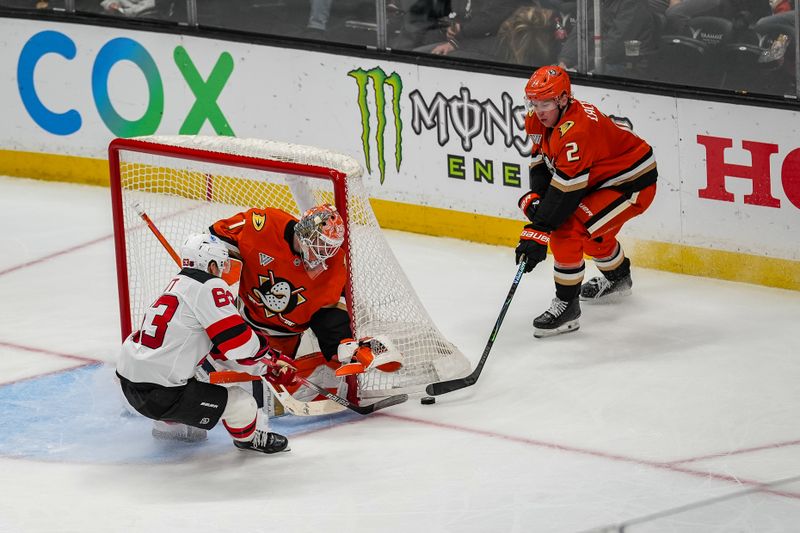 Nov 2, 2025; Anaheim, California, USA; New Jersey Devils forward Jesper Bratt (63) fights to regain the puck following a break away during the second period against the Anaheim Ducks at Honda Center. Mandatory Credit: Corinne Votaw-Imagn Images