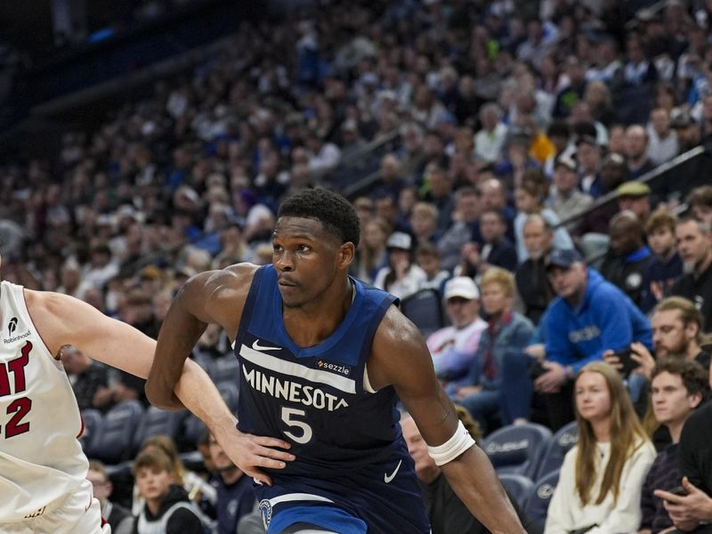 MINNEAPOLIS, MN -  NOVEMBER 10:  Anthony Edwards #5 of the Minnesota Timberwolves drives to the basket during the game against the Miami Heat on November 10, 2024 at Target Center in Minneapolis, Minnesota. NOTE TO USER: User expressly acknowledges and agrees that, by downloading and or using this Photograph, user is consenting to the terms and conditions of the Getty Images License Agreement. Mandatory Copyright Notice: Copyright 2024 NBAE (Photo by Jordan Johnson/NBAE via Getty Images)