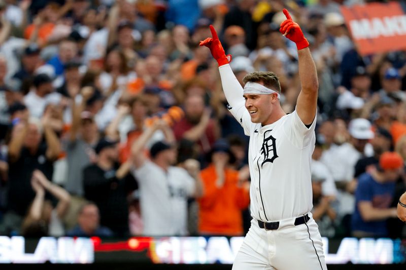 Sep 29, 2024; Detroit, Michigan, USA;  Detroit Tigers designated hitter Kerry Carpenter (30) celebrates after he hits a grand slam in the fifth inning against the Chicago White Sox at Comerica Park. Mandatory Credit: Rick Osentoski-Imagn Images