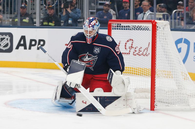 Oct 16, 2025; Columbus, Ohio, USA; Columbus Blue Jackets goalie Elvis Merzlikins (90) makes a save against the Colorado Avalanche during the first period at Nationwide Arena. Mandatory Credit: Russell LaBounty-Imagn Images