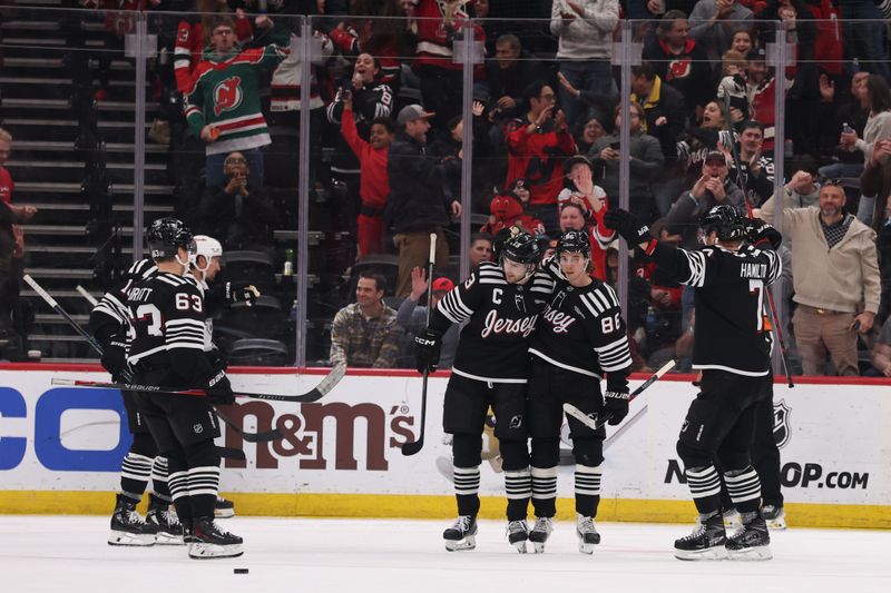 Mar 14, 2026; Newark, New Jersey, USA; New Jersey Devils center Jack Hughes (86) celebrates his goal against the Los Angeles Kings during the third period at Prudential Center. Mandatory Credit: Ed Mulholland-Imagn Images