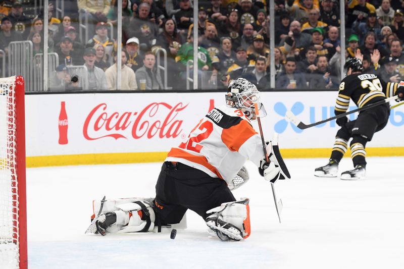 Mar 16, 2024; Boston, Massachusetts, USA; Boston Bruins center Morgan Geekie (39) scores a goal past Philadelphia Flyers goaltender Felix Sandstrom (32) during the first period at TD Garden. Mandatory Credit: Bob DeChiara-USA TODAY Sports