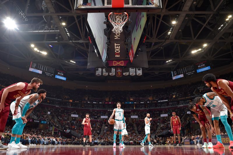 CLEVELAND, OH - JANUARY 5: LaMelo Ball #1 of the Charlotte Hornets prepares to shoot a free throw during the game against the Cleveland Cavaliers on January 5, 2025 at Rocket Mortgage FieldHouse in Cleveland, Ohio. NOTE TO USER: User expressly acknowledges and agrees that, by downloading and/or using this Photograph, user is consenting to the terms and conditions of the Getty Images License Agreement. Mandatory Copyright Notice: Copyright 2025 NBAE (Photo by David Liam Kyle/NBAE via Getty Images)