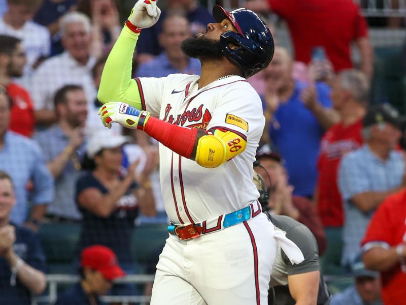 May 8, 2024; Atlanta, Georgia, USA; Atlanta Braves designated hitter Marcell Ozuna (20) celebrates after a home run against the Boston Red Sox in the third inning at Truist Park. Mandatory Credit: Brett Davis-USA TODAY Sports
