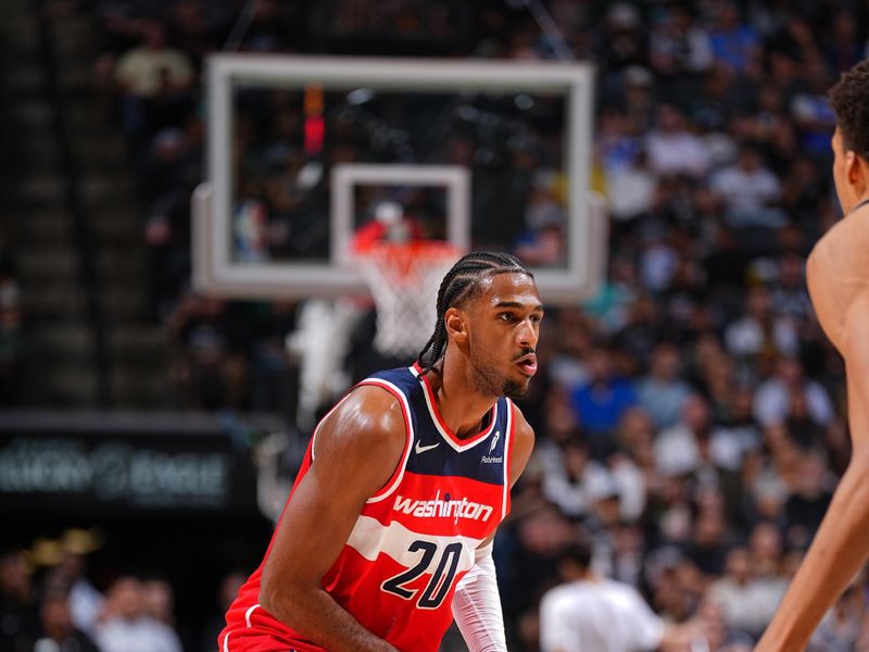 SAN ANTONIO, TX - NOVEMBER 13: Alexandre Sarr #20 of the Washington Wizards dribbles the ball during the game against the San Antonio Spurs on November 13, 2024 at the Frost Bank Center in San Antonio, Texas. NOTE TO USER: User expressly acknowledges and agrees that, by downloading and or using this photograph, user is consenting to the terms and conditions of the Getty Images License Agreement. Mandatory Copyright Notice: Copyright 2024 NBAE (Photos byGarrett Ellwood/NBAE via Getty Images)