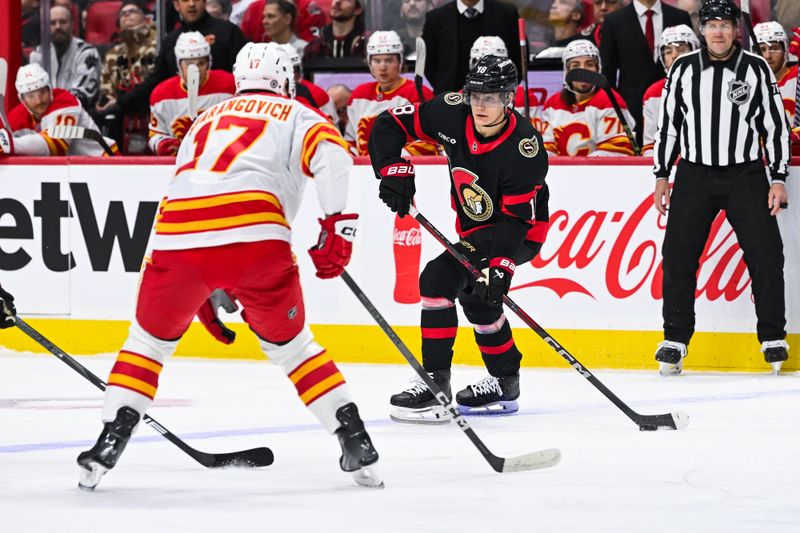 Nov 25, 2024; Ottawa, Ontario, CAN; Ottawa Senators center Tim Stutzle (18) plays the puck against the Calgary Flames during the first period at Canadian Tire Centre. Mandatory Credit: David Kirouac-Imagn Images