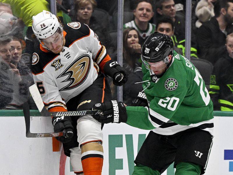 Jan 25, 2024; Dallas, Texas, USA; Dallas Stars defenseman Ryan Suter (20) checks Anaheim Ducks left wing Brock McGinn (26) during the first period at the American Airlines Center. Mandatory Credit: Jerome Miron-USA TODAY Sports