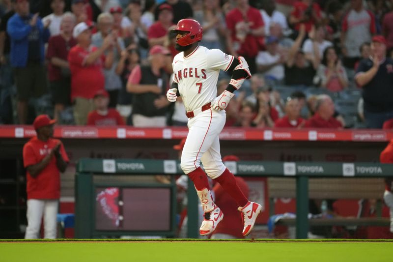 Aug 31, 2024; Anaheim, California, USA; Los Angeles Angels right fielder Jo Adell (7) runs the bases after hitting a home run in the third inning against the Seattle Mariners at Angel Stadium. Mandatory Credit: Kirby Lee-USA TODAY Sports