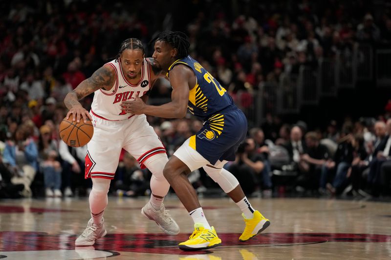 CHICAGO, ILLINOIS - MARCH 27: DeMar DeRozan #11 of the Chicago Bulls dribbles the ball against Aaron Nesmith #23 of the Indiana Pacers during the first half at the United Center on March 27, 2024 in Chicago, Illinois. NOTE TO USER: User expressly acknowledges and agrees that, by downloading and or using this photograph, User is consenting to the terms and conditions of the Getty Images License Agreement. (Photo by Patrick McDermott/Getty Images)